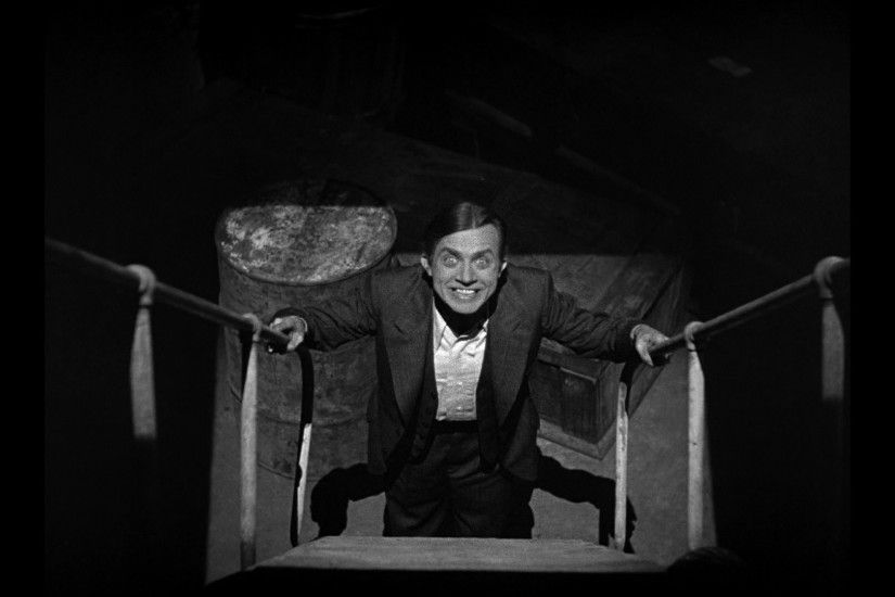 ... Renfield is stark raving mad in a scene from the 1931 classic film  version of Dracula ...