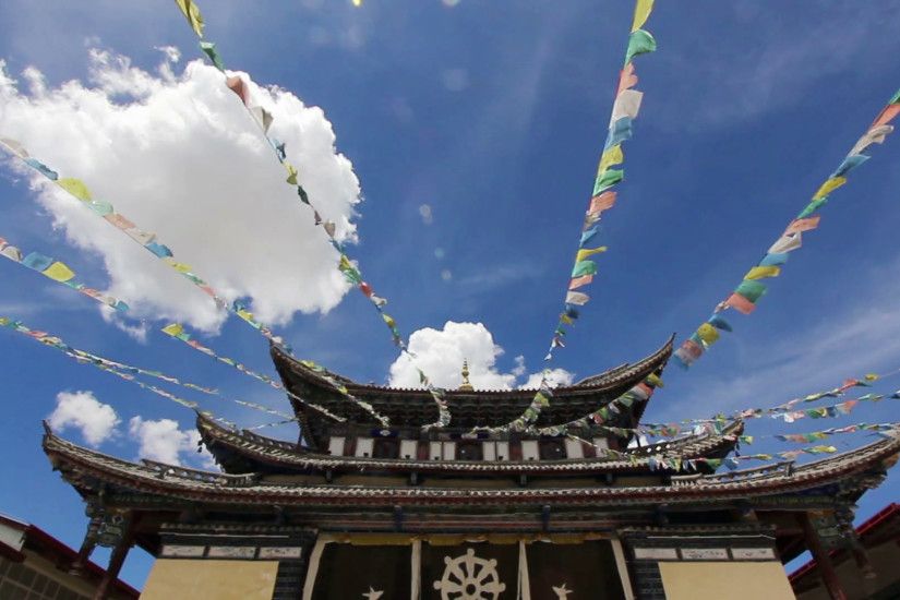 Prayer flag of the golden temple in historical old town in chinese city  shangri-la alias zhongdian Stock Video Footage - VideoBlocks