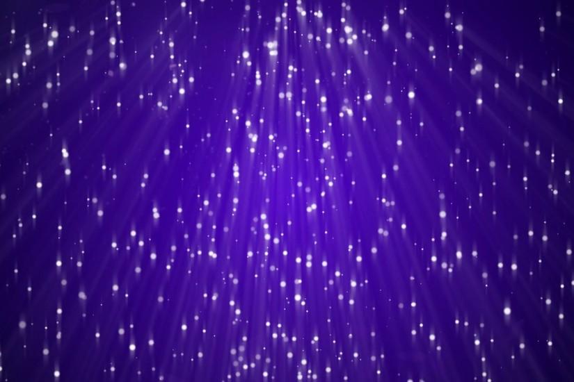 Sparkling light that looks like glitter or snow slowly falls against a purple  background. Light rays faintly shine off them. Motion Background -  VideoBlocks