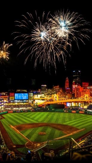 Baseball stadium with fireworks in the night