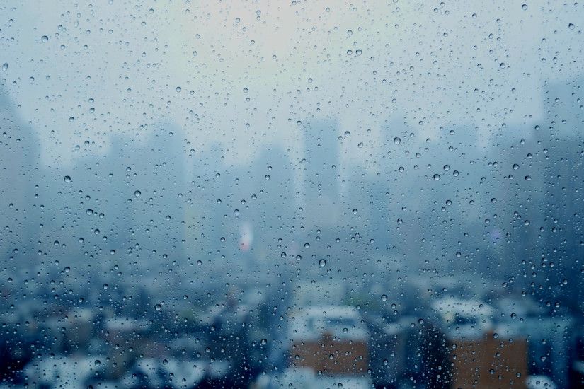 rainy day in the city. rain drops on window glass. depressive mood  background