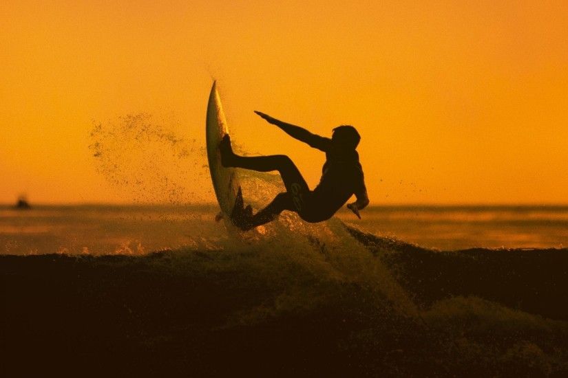 sunset surfing men athlete ocean wave