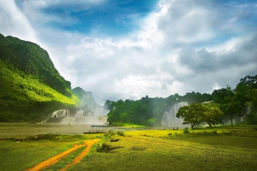 Amazing waterfalls between green hills wallpaper