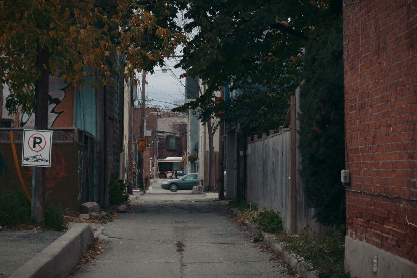 Establishing shot of an alleyway in a ghetto neighborhood. Stock Video  Footage - VideoBlocks
