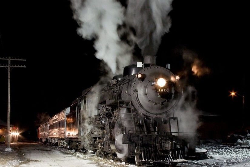Title. Steam locomotive at night