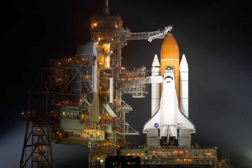 And in the 4th wallpaper is the NASA Discovery Shuttle on the launch  platform ready for download in 4K, HD and wide sizes