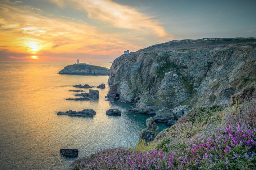 england north wales rock. sunset lighthouse