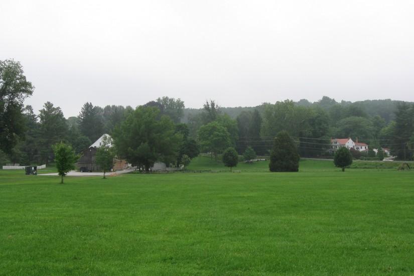The cluster of buildings at Union Mills is in the left background. The  William Shriver House is the white building in the right background.