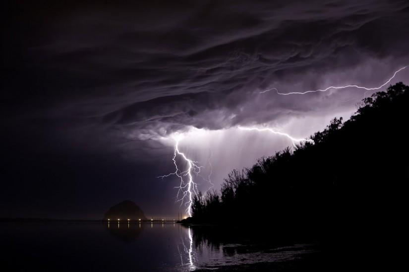 nature night rain beach mountain cyclone dangerous dark background  lightning the storm