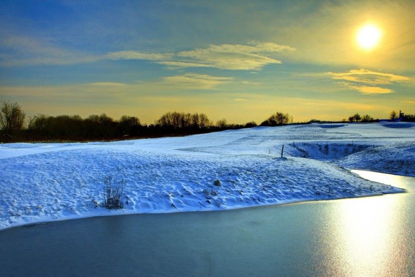Snowy Hills River Yellow Sunny wallpapers and stock photos