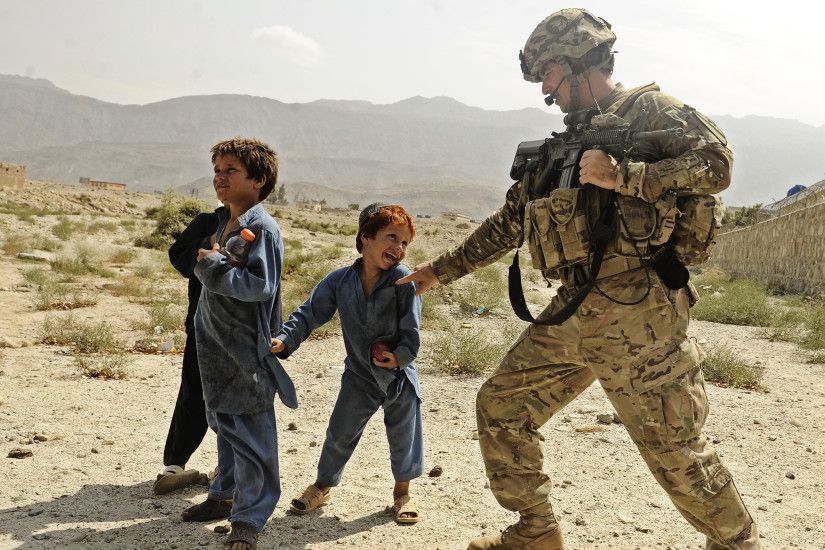 File:US Soldier plays with Afgan kid.jpg