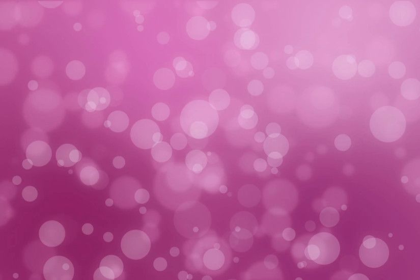 Bokeh holiday background with floating particles against a magenta pink  gradient backdrop Motion Background - VideoBlocks
