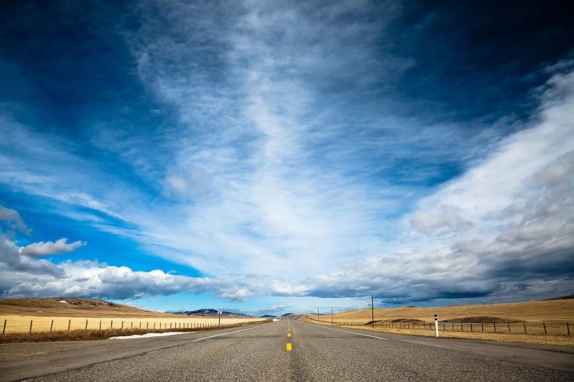 Road and Cloudy Blue Sky Wallpaper and Stock Photo
