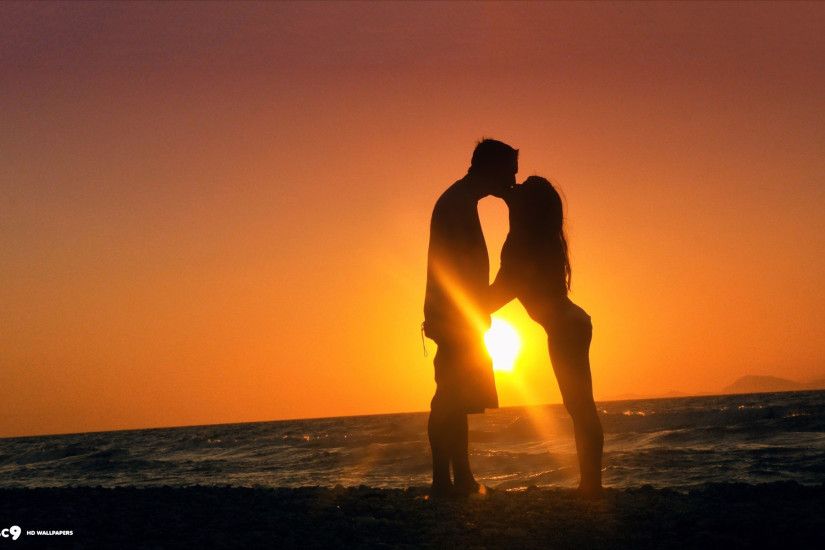 romantic kiss sunset sun sea cute couple scenery silhouette hd wallpaper