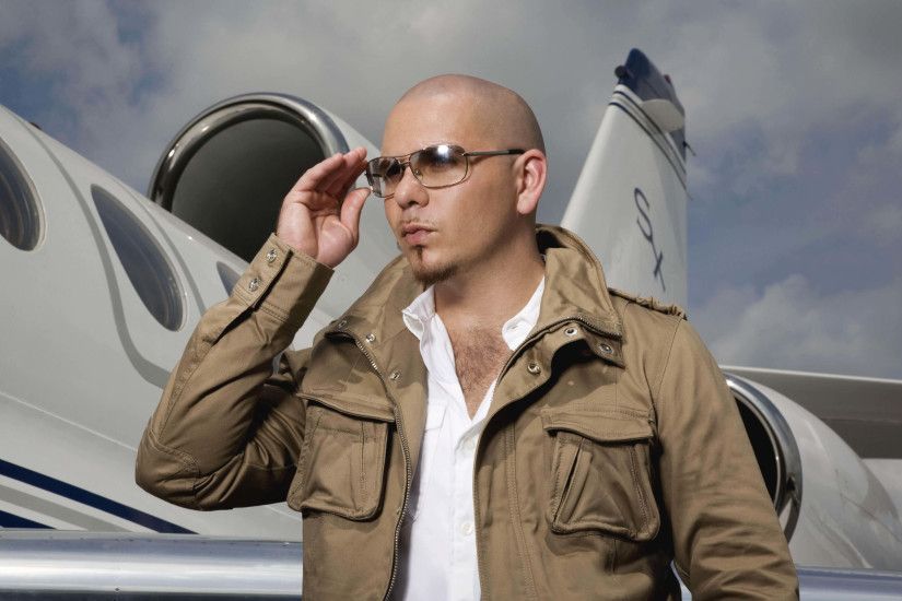 Pitbull With A Private Jet. Rate Wallpaper. DOWNLOAD IMAGE