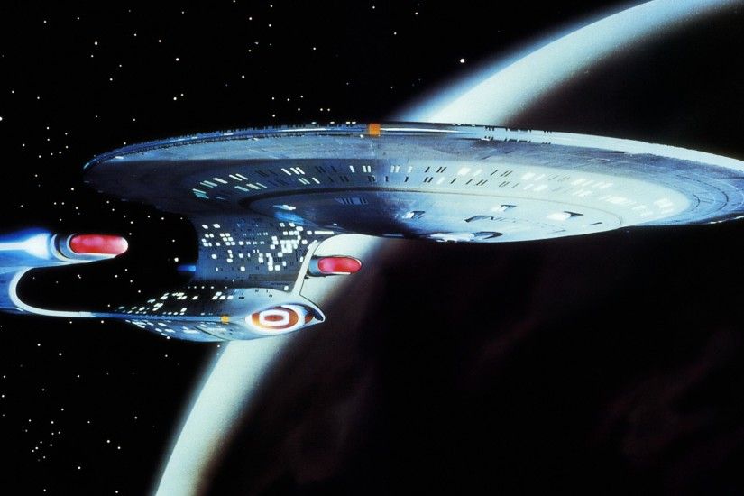I adore the metallic blue sheen the Enterprise takes on in this picture,  and how