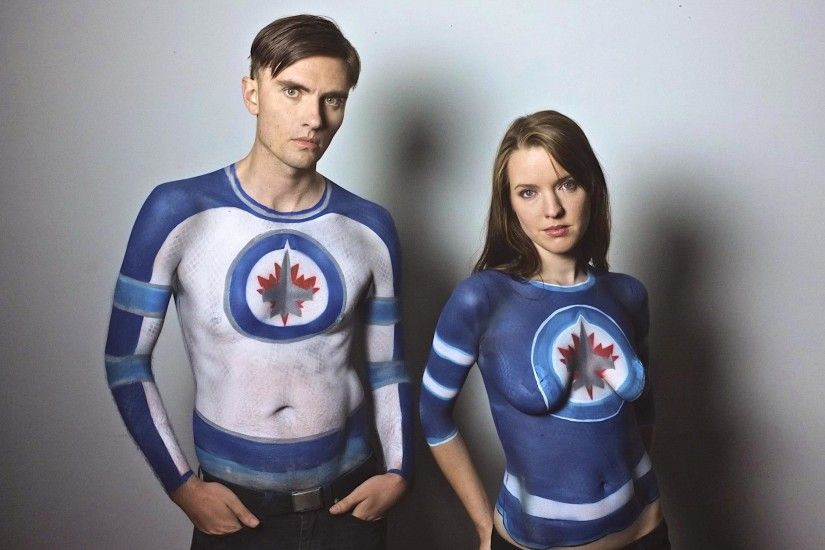 Winnipeg Jets fans body paint jerseys! Very cool.