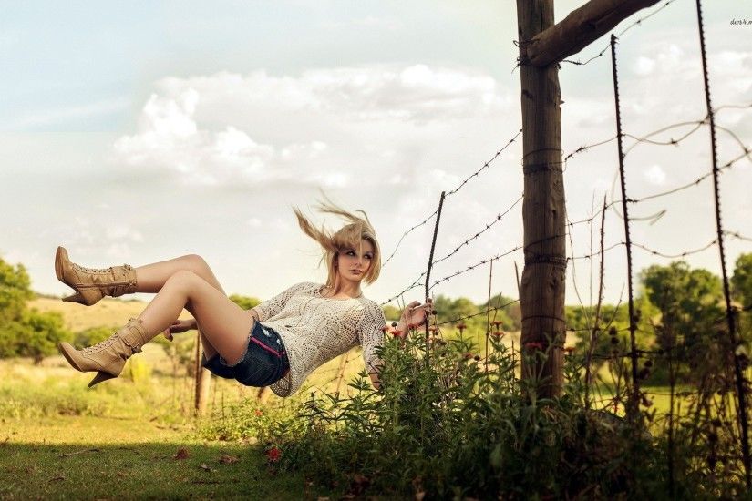 Girl Falling Over The Barbed Wire Fence 709429