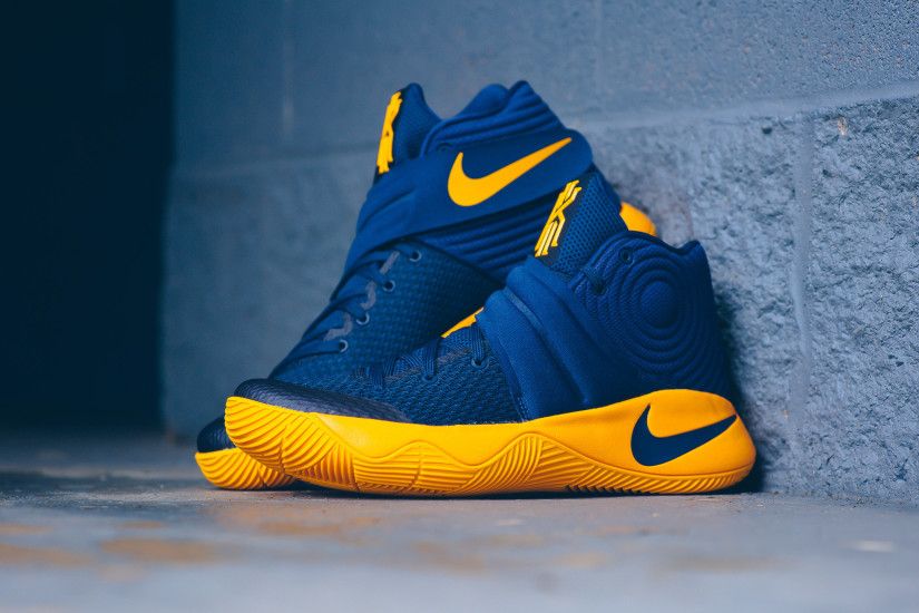 Detailed images of the Nike Kyrie 2 Cavs are featured. Look for it at Nike