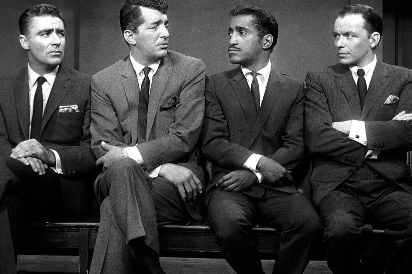 Sammy Davis Jr. is pictured below on stage in Las Vegas in the Copa Room at  The Stardust with fellow Rat Pack members Dean "Dino" Martin on the far  left of ...
