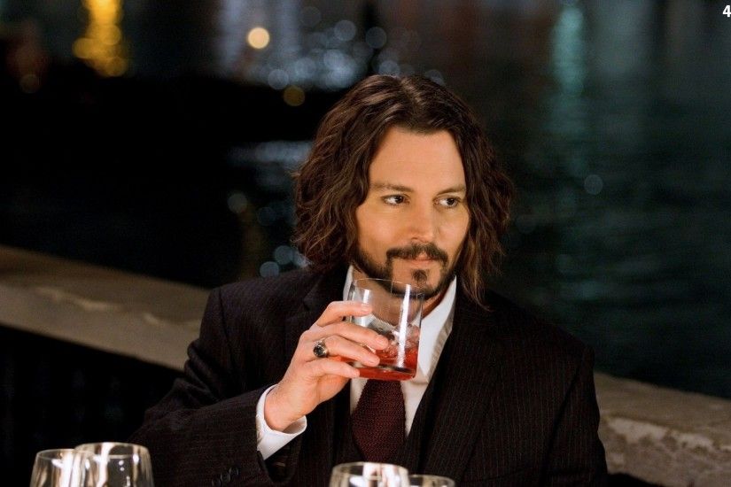 ... Drink, a man, Johnny Depp ...