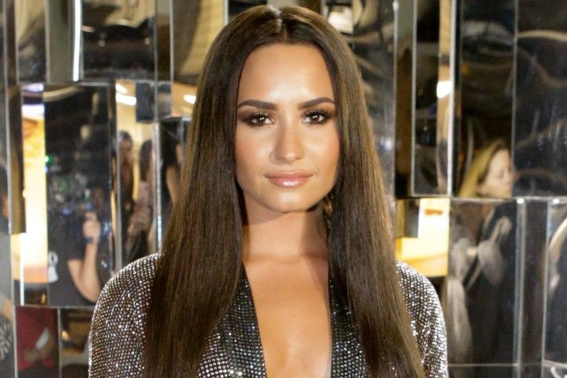 Demi Lovato rocks a super-sleek look before performing in The Bee Gees  tribute.