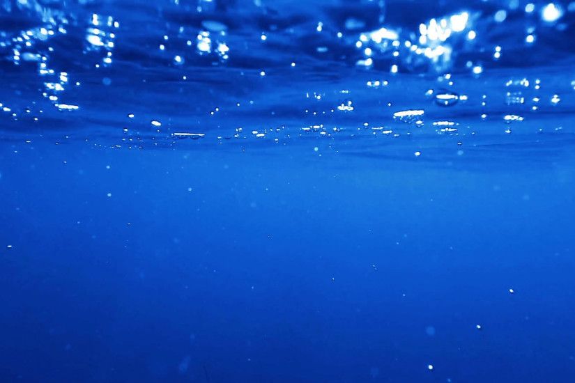 Under the sea, underwater view of blue ocean water with air bubbles