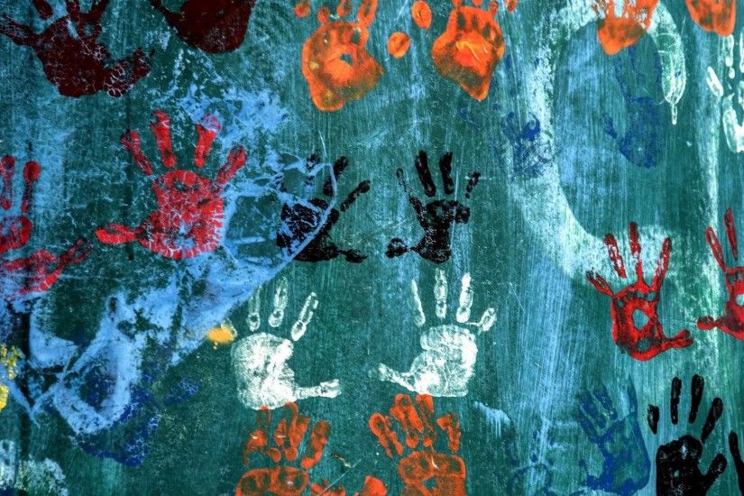 Handprints on the wall wallpaper