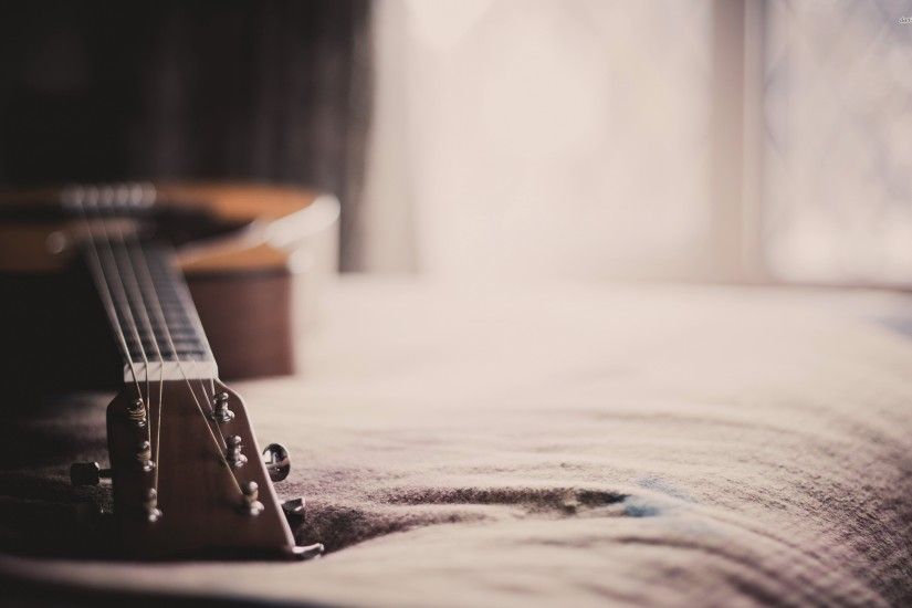 Guitar on the bed wallpaper - 1068877