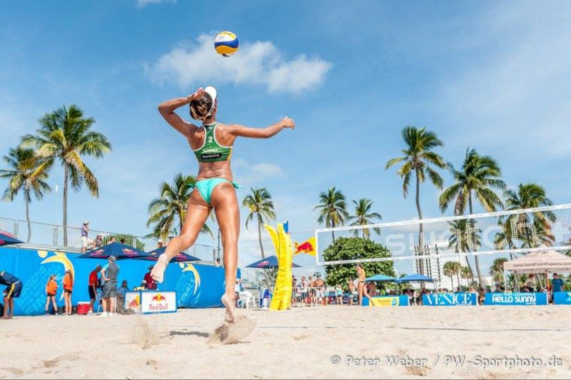 Jump Serve on Beach Volleyball Court