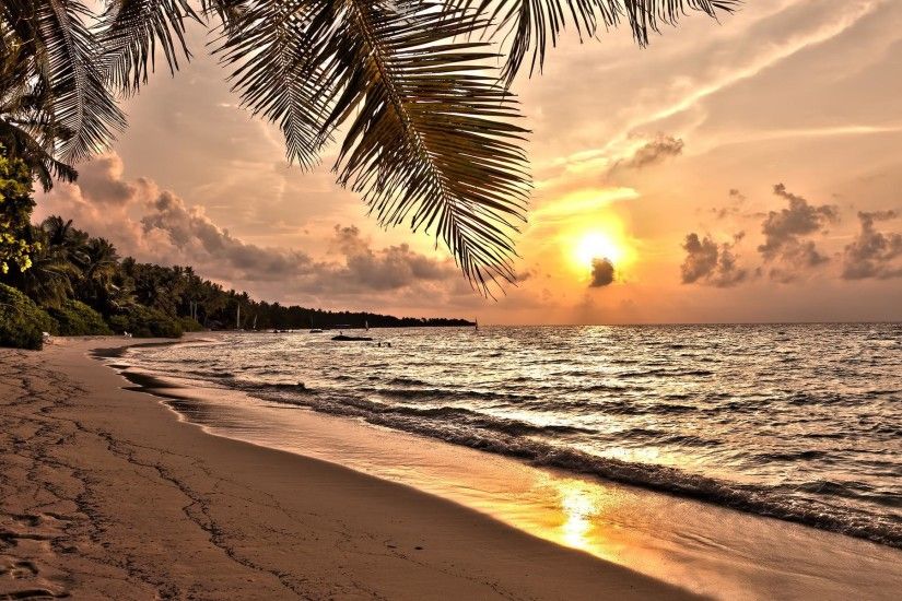 magnificent-sunset-over-tropical-beach-wallpaper-535f989c95808.jpg (
