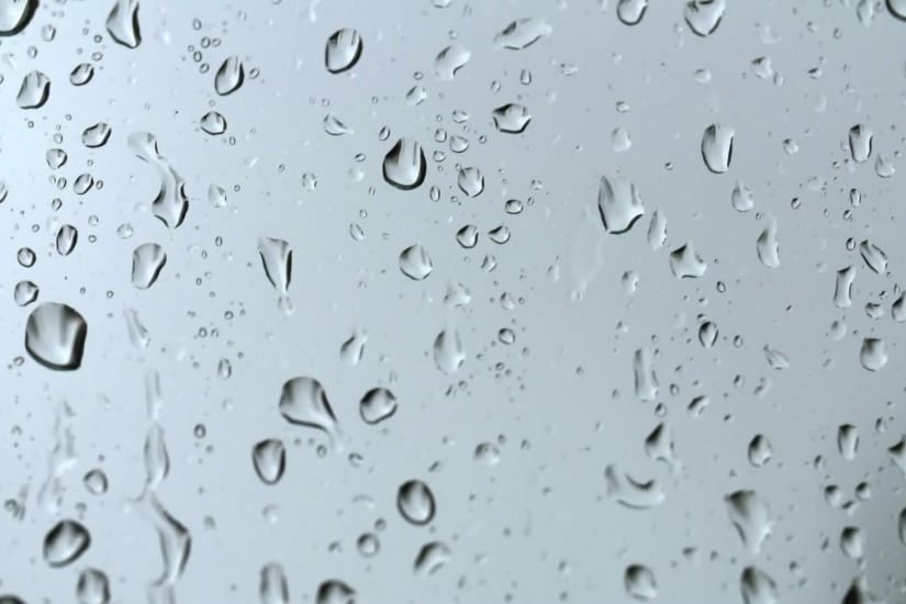 Raindrops on Glass Background