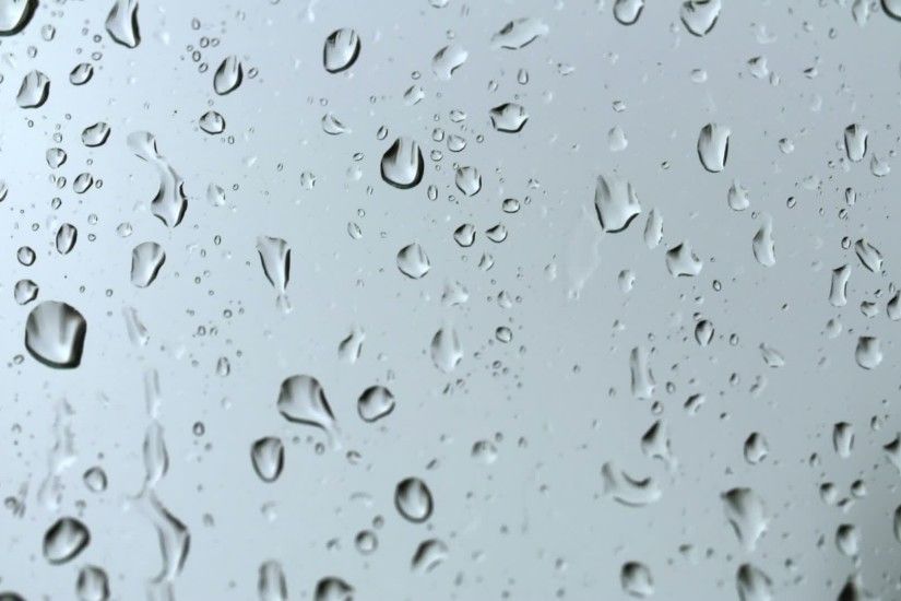 raindrops on glass background free stock video footage download clips
