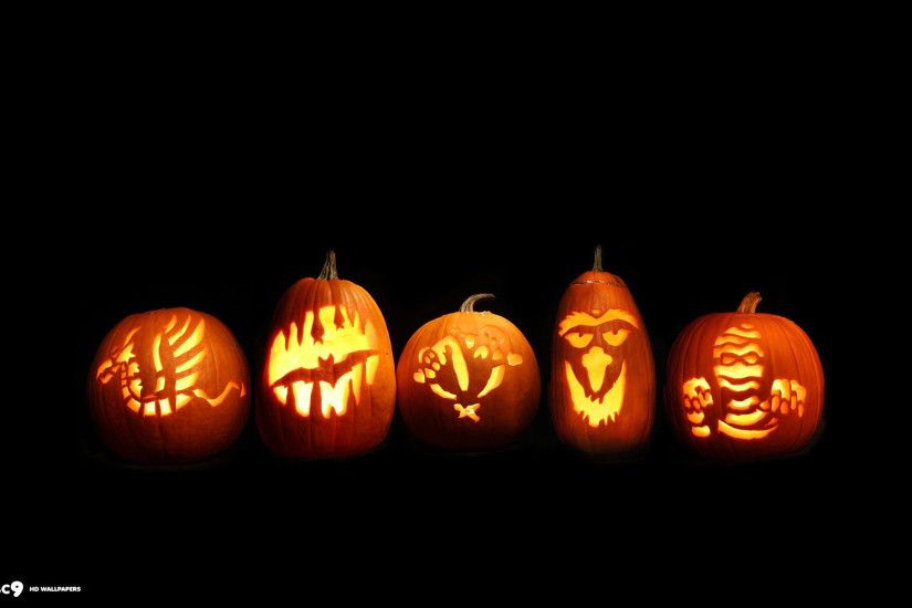 halloween five carved pumpkins jack o lanterns lights glowing holiday desktop  background