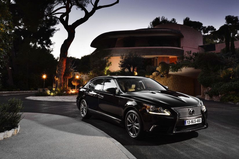 “Home sweet Home” Lexus LS460 parked in the front gate of home