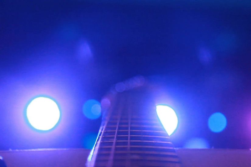 rock concert: backstage: guitar on the background of stage lighting Stock  Video Footage - VideoBlocks