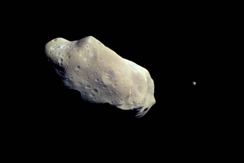 An Asteroid and Its Moon | Space Wallpaper