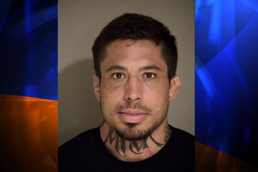 The booking photo for MMA fighter Jonathan "War Machine" Koppenhaver, who  allegedly beat