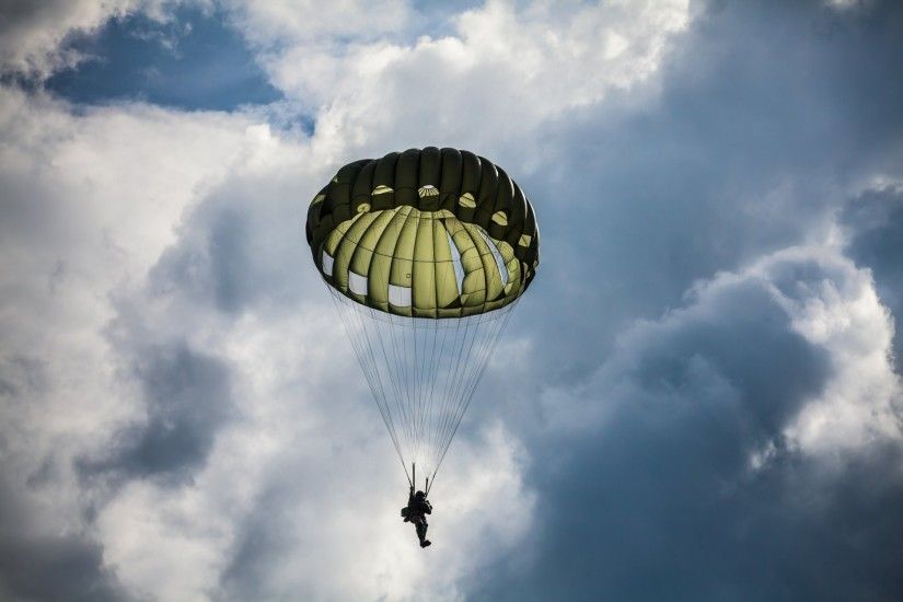 sky clouds parachute man
