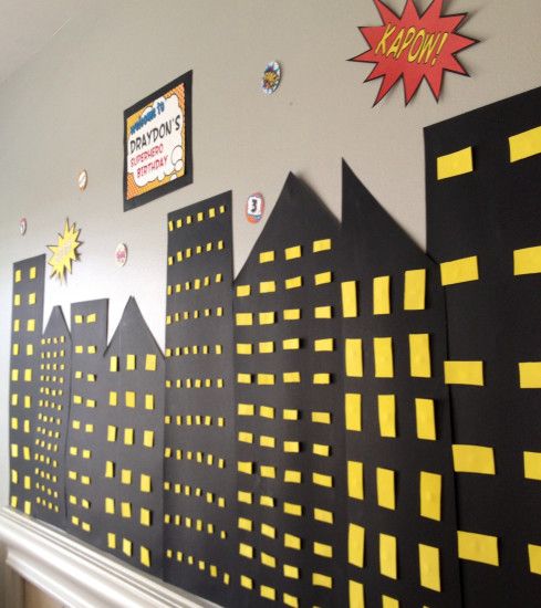 Superhero birthday party. Would be easy to do on a wall with black poster  board