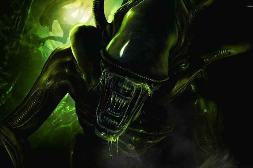 Scary green alien wallpaper
