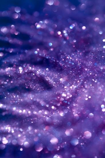 a purple background of defuse glitter and specular highlights