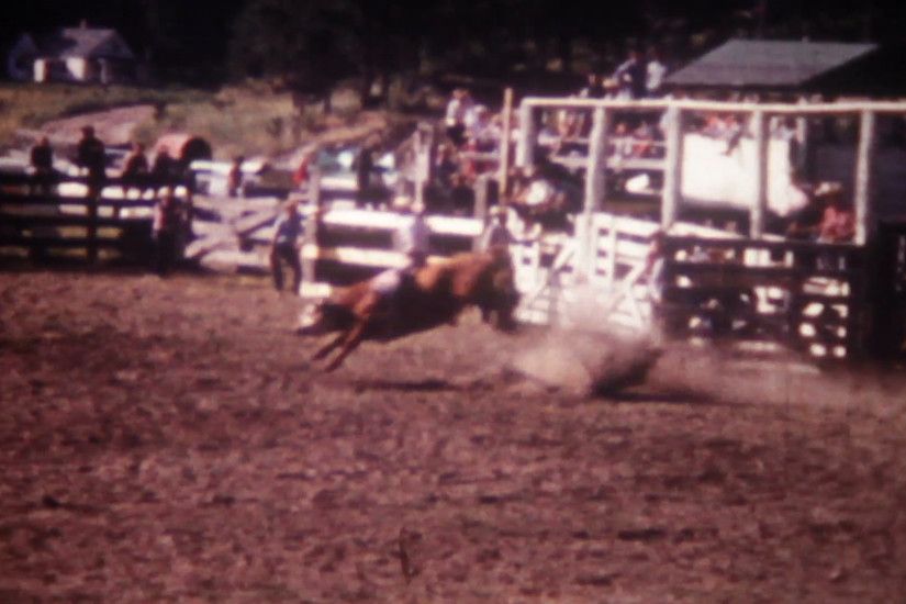 fast & furious rodeo bull riding competition at local arena out west 3069  Vintage, archive film, family home movie Stock Video Footage - VideoBlocks