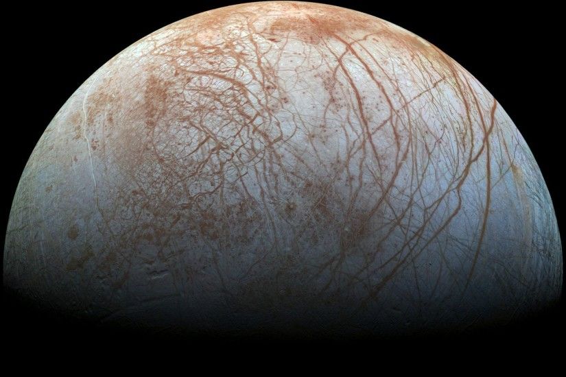 The puzzling, fascinating surface of Jupiter's icy moon Europa looms large  in images taken by