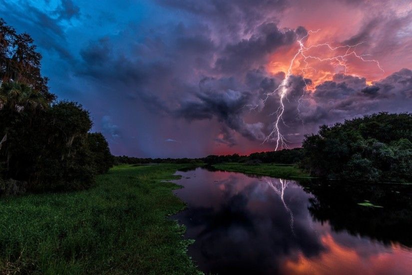 nature summer night sky lightning clouds the storm river reflection