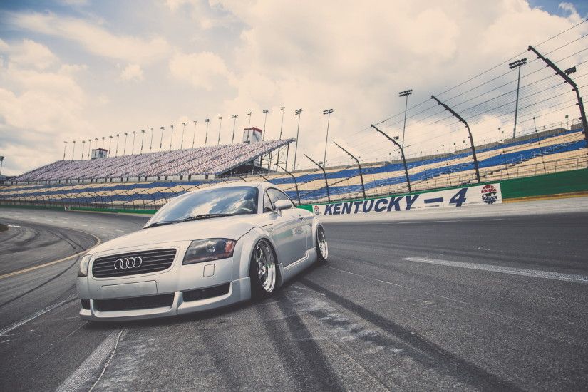 silver Audi coupe on racetrack HD wallpaper