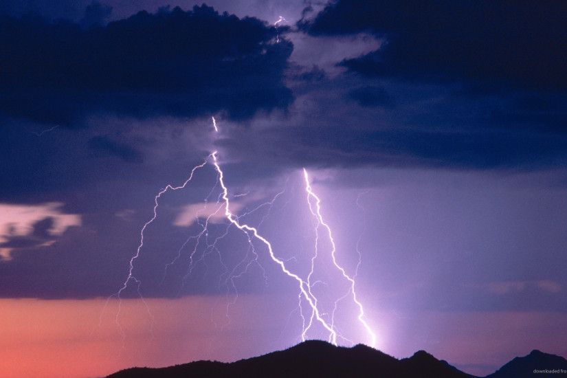 Lightning bolt on the top of a mountain picture