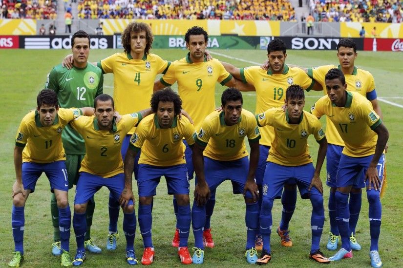 Brazil's players line up for a team photo before their Confederations Cup  Group A soccer match Spain ...