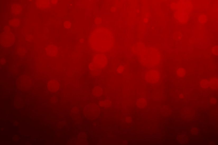 Subscription Library Abstract red background with floating particles.  Seamlessly loopable animation.